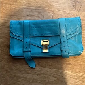 Proenza Schouler PS1 Clutch Bag Turquoise Blue Leather Clasp loose.